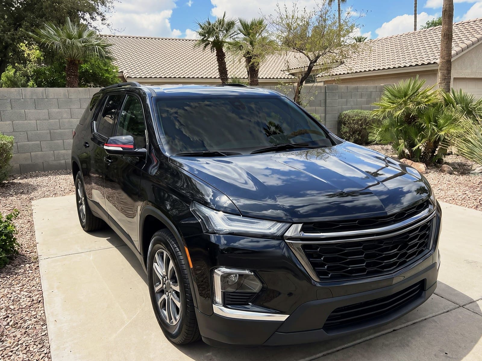 A black SUV in a driveway in Paradise Valley, AZ, after a Bang AutoGlass mobile glass job